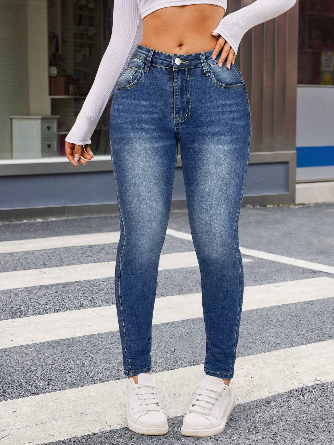 Washed blue skinny jeans, slim cut, elastic comfort fabric, daily commute wear, women's jeans and clothing