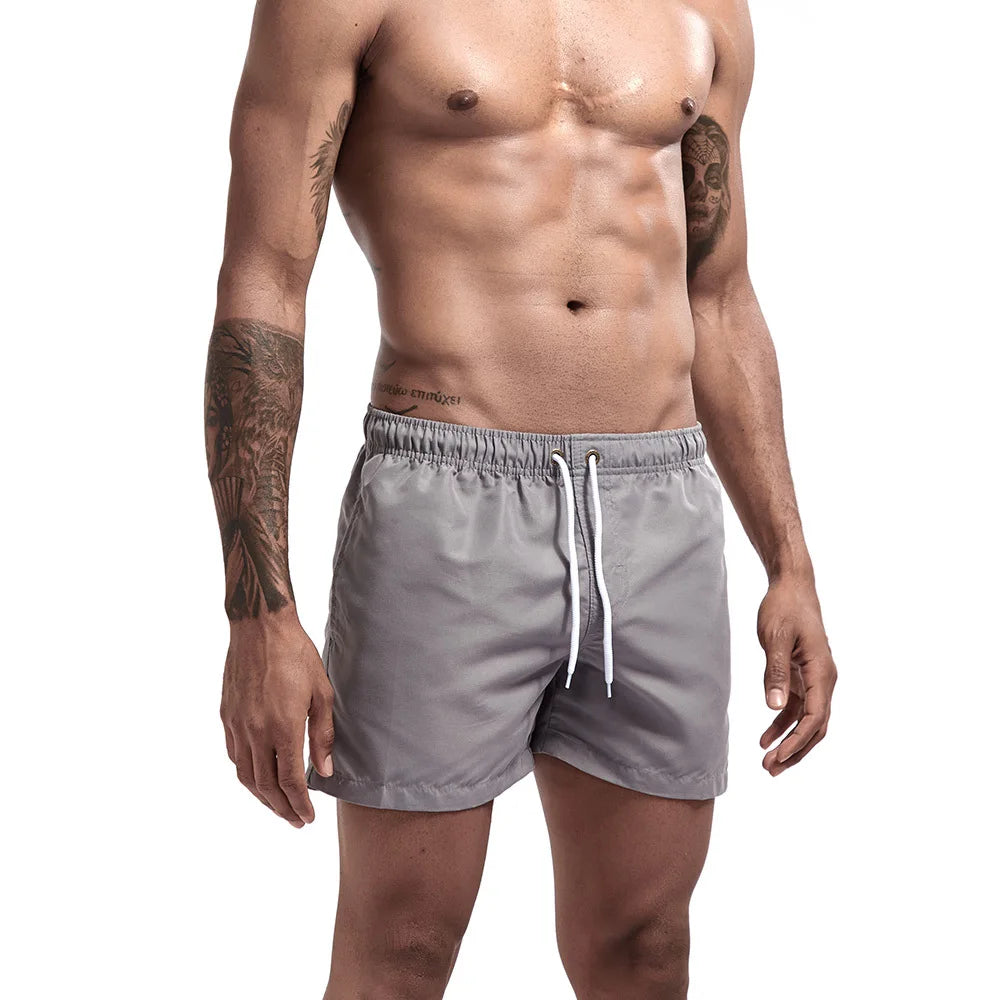 Herren Schnelltrocknende Board Shorts Schwimmhose Badeanzug Atmungsaktiv Kordelzug Mit Taschen