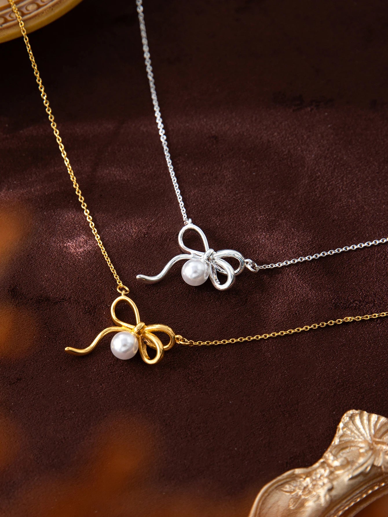 Fashionable and minimalist pearl bow tie pendant necklace,copper,electroplated 18K gold color protection, Valentine's Day gift