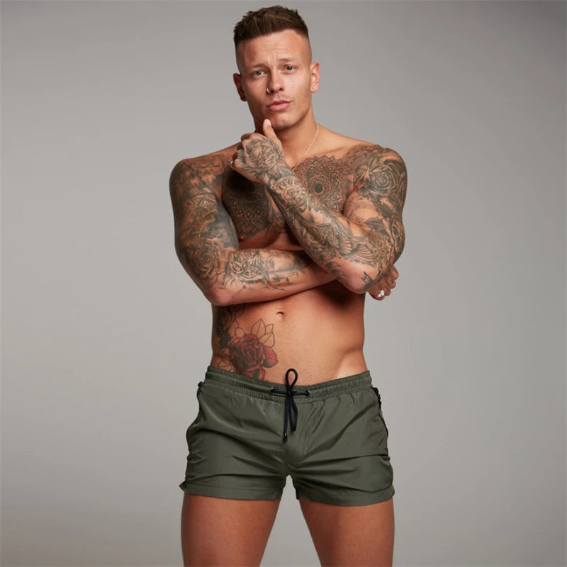 Herren Schwimmhose 2025 mit Reißverschluss-Taschen Mesh-Futter Sommer Strand Board Shorts Schnelltrocknend Schwimmen Badeanzug Schwimmanzug Schwimmbekleidung