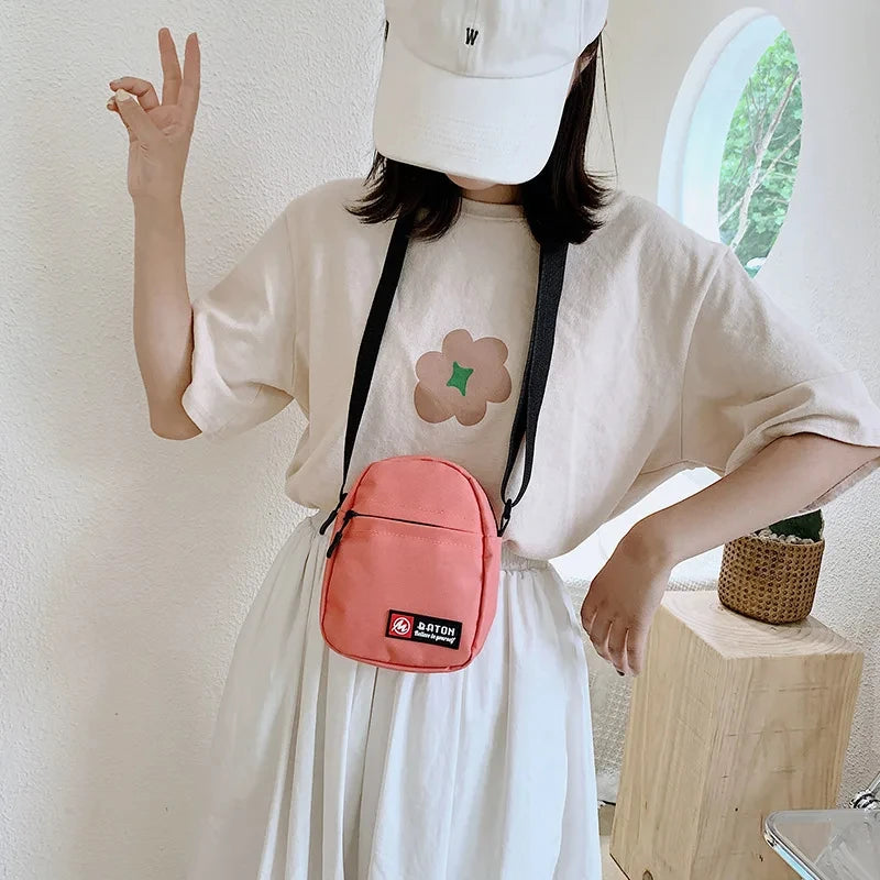 Canvas-Tasche 2025: New Fashion Crossbody Women's - Mobile Canvas Student Versatile Outdoor Sports Mini Collection