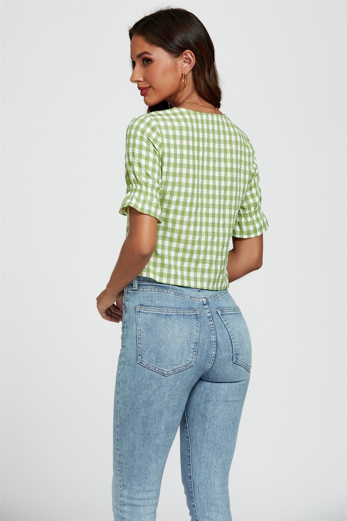 Top verde cu imprimeu în carouri și nod în față