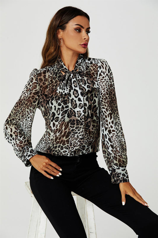 Bluză cu mânecă lungă și detalii legate în culoarea bej 