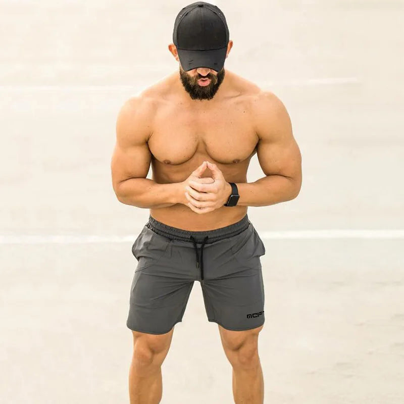 Marke Sommer Herren Slim Fit Shorts Wadenlang Fitness Bodybuilding Mode Casual Gyms Sportbekleidung Jogger Workout Kurze Hosen