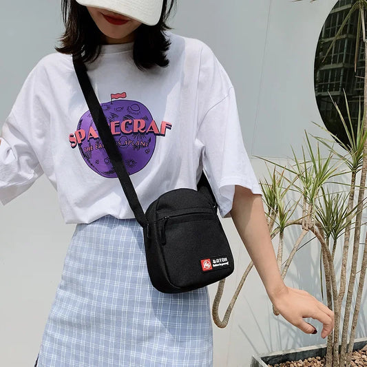 Canvas-Tasche 2025: New Fashion Crossbody Women's - Mobile Canvas Student Versatile Outdoor Sports Mini Collection