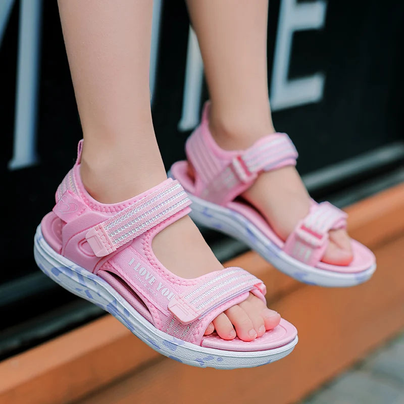 Sandalen Mädchen 2025 - Weiche Sohlen Casual Schuhe Modische Prinzessin - Neue Blumen Rosa Flache Schuhe Rutschfest Strand Kinder 7-13J