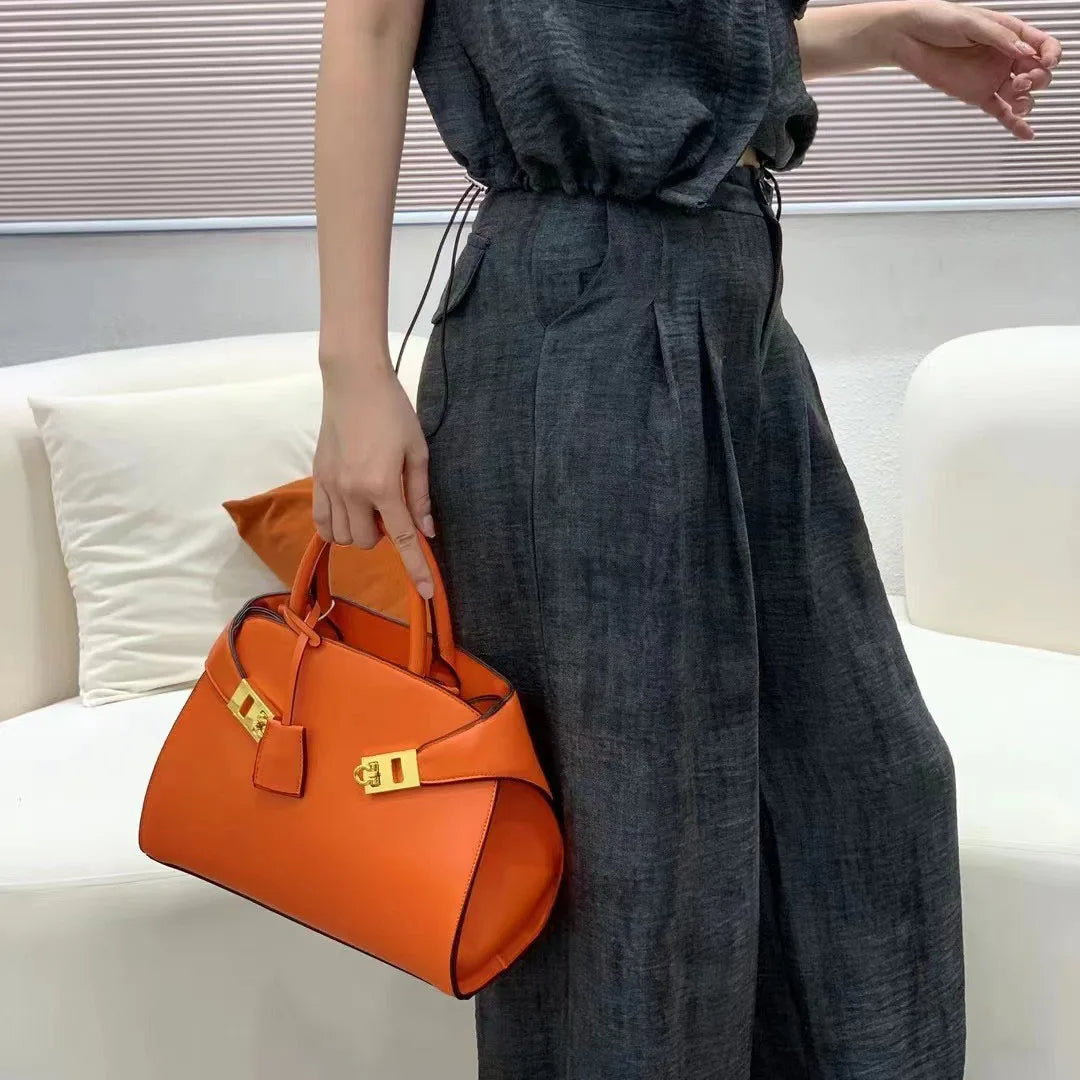 Ari modern classic shell bag – soft structured style double lock charm