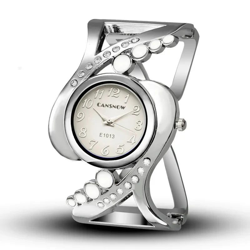 Damen-Uhr 2025: Luxury Women's Bangle Wrist Watch Ladies Elegant Quartz Watch - Female Rhinestone Fashion Clock Girls Bracelet Watch Saati Relojes Collection