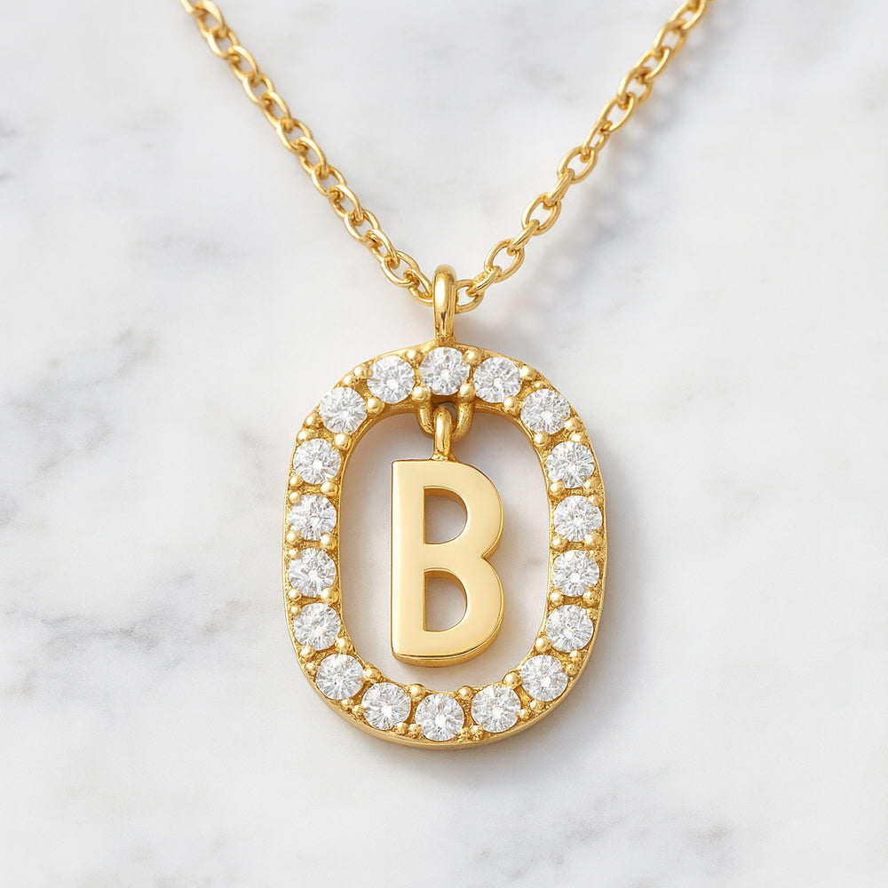 Colier cu pandantiv din argint 925, diverse litere într-un cerc cu strasuri, 45cm