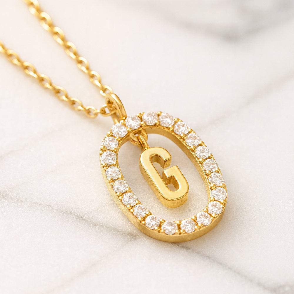 Colier cu pandantiv din argint 925, diverse litere într-un cerc cu strasuri, 45cm