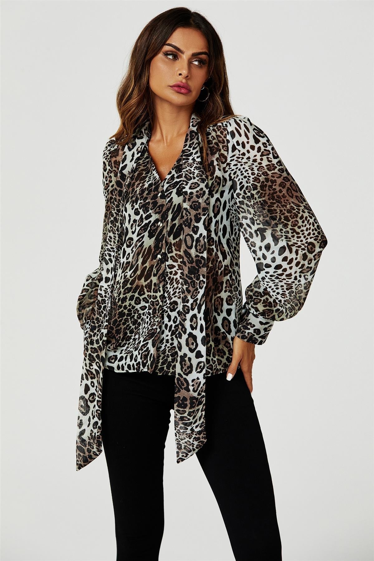 Bluză cu mânecă lungă și detalii legate în culoarea bej 