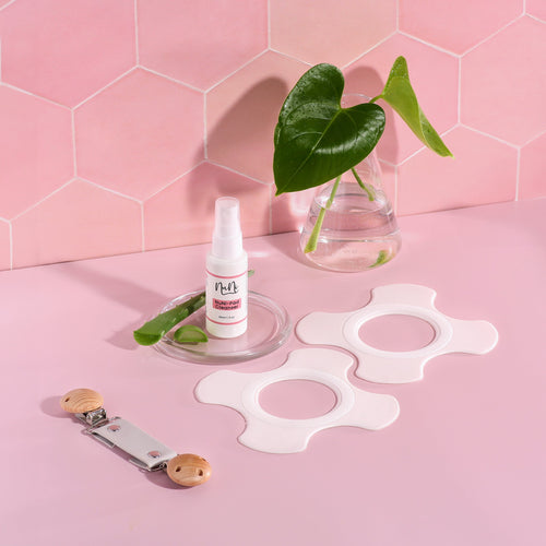 NuNi Stillpads - Wiederverwendbare Stillpads Mit Clip 2x Pads, 1x Spray